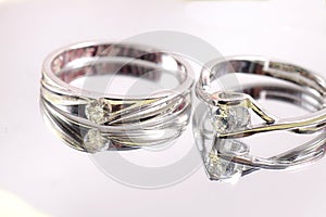 Close up shot of pair engagement /  mariage rings isolated