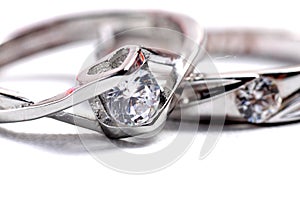 Close up shot of pair engagement /  mariage rings isolated photo