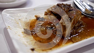 Close up shot of people eating smoked fish of cold platter