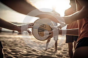 Close up shot of people hand holding volley ball at beach.