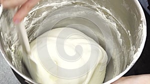 Close up shot of a professional chef preparing delicious cream for desserts