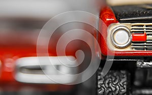 Close up shot of red diecast car models