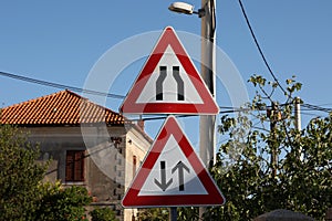 Close-up shot of road signs on the streets of Croatia