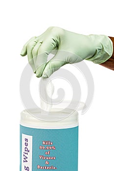 Close Up Shot of Rubber Gloved Hand Pulling Up On Disinfectant Wipe