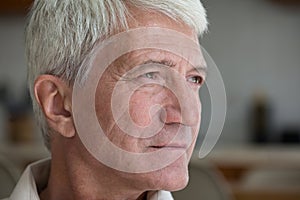 Closeup sad thoughtful silver haired elderly man pensioner look aside