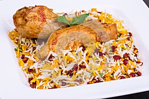 Close up shot of Saffron Rice and Barberries & x28;Zereshk polo& x29; with Chicken