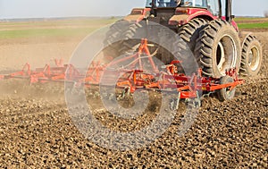 Close up shot of seedbed cultivator machine at work