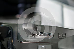 Close up of Modern car automatic gearbox and control buttons in EV car photo