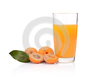 Close-up shot sliced orange apricots with juice and leaf