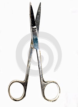 Close up shot of a small scissor isolated on a white background