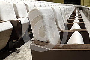 Close-up shot of soft empty seats in rows in an auditorium at a convention center