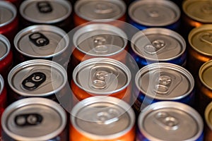 Close up shot of softdrink cans in a row