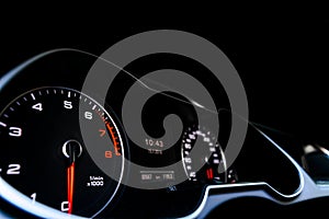 Close up shot of a speedometer in a car. Car dashboard. Dashboard details with indication lamps.Car instrument panel. Dashboard wi