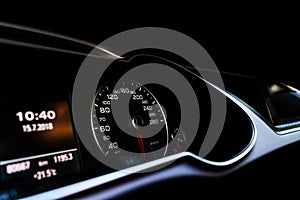 Close up shot of a speedometer in a car. Car dashboard. Dashboard details with indication lamps.Car instrument panel. Dashboard wi