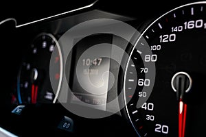 Close up shot of a speedometer in a car. Car dashboard. Dashboard details with indication lamps.Car instrument panel. Dashboard wi