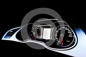 Close up shot of a speedometer in a car. Car dashboard. Dashboard details with indication lamps.Car instrument panel. Dashboard wi