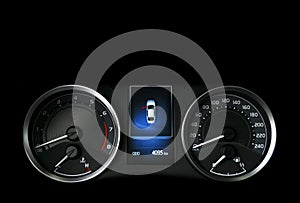 Close up shot of a speedometer in a car. Car dashboard. Dashboard details with indication lamps.Car instrument panel. Dashboard wi