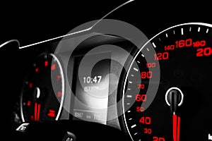 Close up shot of a speedometer in a car. Car dashboard. Dashboard details with indication lamps.Car instrument panel. Dashboard wi