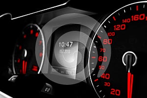 Close up shot of a speedometer in a car. Car dashboard. Dashboard details with indication lamps.Car instrument panel. Dashboard wi