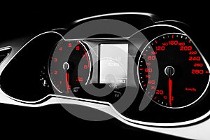 Close up shot of a speedometer in a car. Car dashboard. Dashboard details with indication lamps.Car instrument panel. Dashboard wi