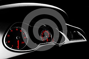 Close up shot of a speedometer in a car. Car dashboard. Dashboard details with indication lamps.Car instrument panel. Dashboard wi