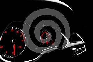 Close up shot of a speedometer in a car. Car dashboard. Dashboard details with indication lamps.Car instrument panel. Dashboard wi