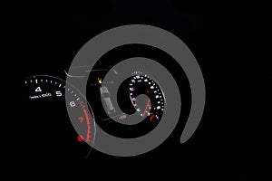 Close up shot of a speedometer in a car. Car dashboard. Dashboard details with indication lamps.Car instrument panel. Dashboard wi