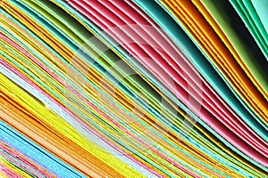 Close up shot of stack of colorful papers