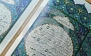A close-up shot of Surah Al-Fatihah in the first pages of the Holy Quran, Quran holy books of Muslims, Allah, and God, Muslim, photo