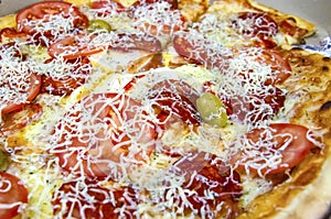 Close up shot of a surface of a pizza