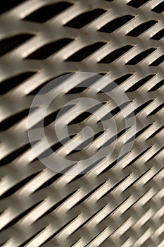 Close-up shot of a textured metal grille.