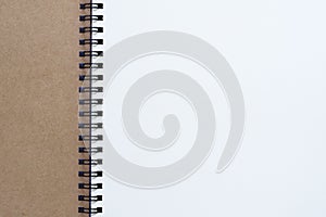 Close up shot of top view of closed spiral blank recycled paper