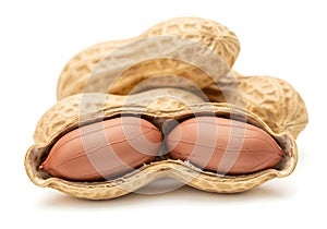 Two peanuts in a shell with one open revealing kernels