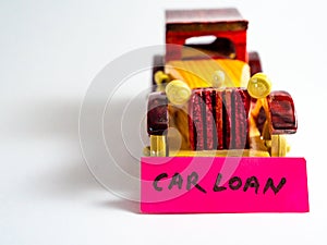 Close up shot of a vintage toy car with white background and copy space for loan concept