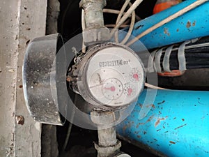 Close-up shot water meter. Water meter for supply consumption mesurement of home plumbing system
