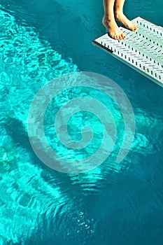 Close up shot of woman diving in pool