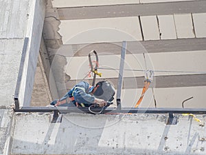 Close up shot of a worker welding in a construction site photo