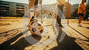 Close Up Shot : Young Boy Stopping a Ball with his Foot. Young Football Players Getting Ready to