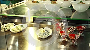 Close-up, showcase with salads and jelly desserts in canteen, mess hall, cafeteria, Food Buffet resturant. lunch in self