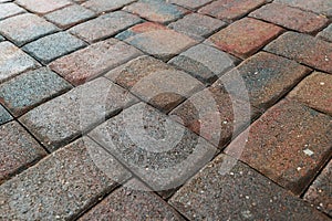 Close up showing driveway area sealant to protect the bricks paving. New construction, South Florida