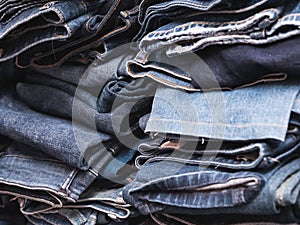 Close up on the side of the blue jeans stack