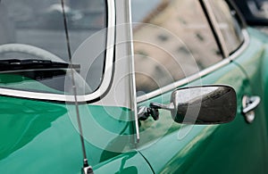 Close-up of the side mirror of a classic design