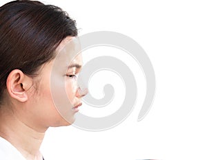 Close up side view face of asian woman with nose plastic surgery for beauty and cosmetic concept, white background