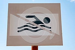 Close up sign of no swimming around the area