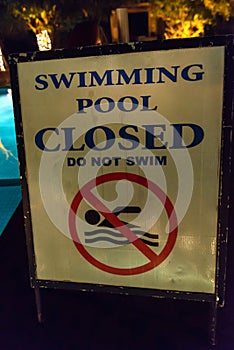 Close up of signs in swimmimg pool