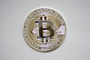 Close up of a silver bitcoin coin