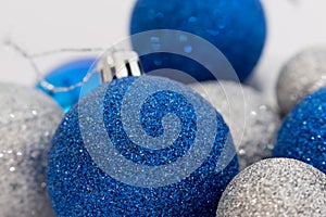 Close up of silver and blue shiny Christmas balls