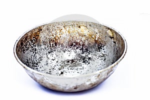 Close up of silver colored empty woks or rounded pan or karahi or kadahi isolated on white widely used in Asia for frying purposes