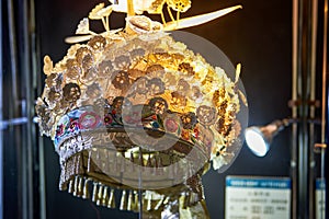 Close-up of a silver headdress of the Zhuang nationality in Guangxi, China