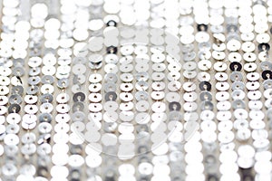 Close up of silver sequined textile texture